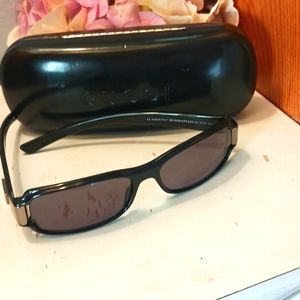 Gucci sun glasses with hard case